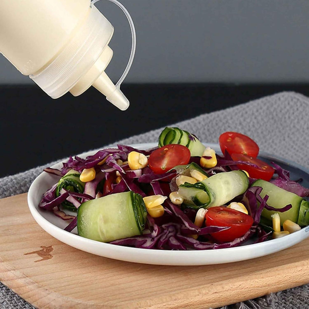 Set of 12 plastic squeeze bottles with caps, perfect for ketchup, mustard, and sauces. Each bottle holds 150 ML for easy dispensing - Singhal Mart